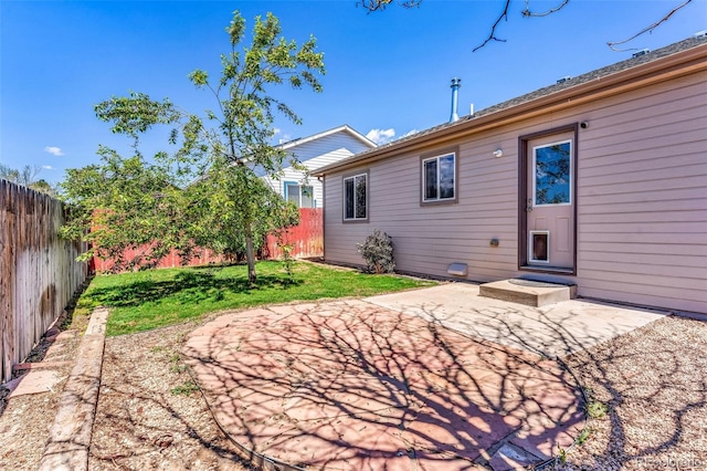 835 Juliana Ct, Canon City, CO 81212 - back of house with a yard, a patio area, and a fenced backyard