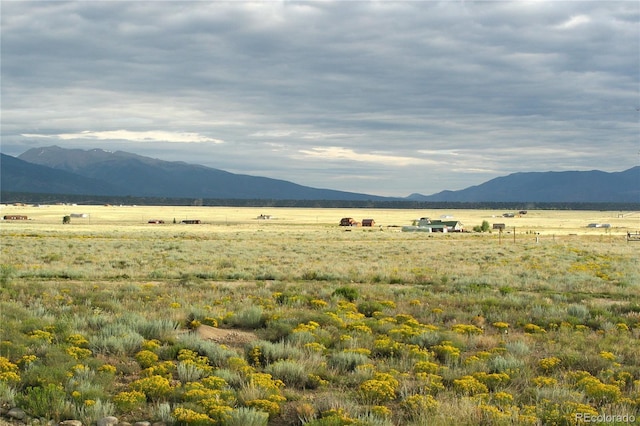 property view of mountains with a rural view