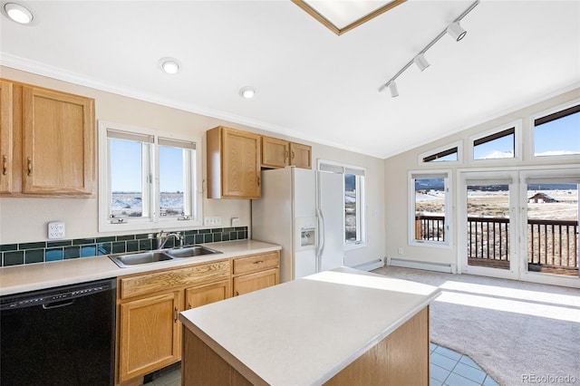 kitchen featuring lofted ceiling, black dishwasher, white refrigerator with ice dispenser, decorative backsplash, and sink