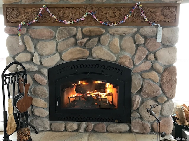 20155 Hideout Ln, Nathrop, CO 81236 - detailed view of a lit fireplace