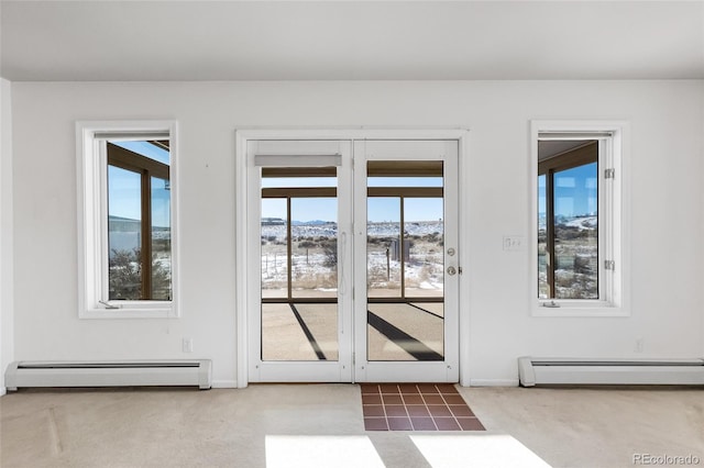 20155 Hideout Ln, Nathrop, CO 81236 - doorway featuring baseboard heating, carpet, and plenty of natural light