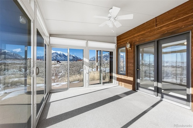 20155 Hideout Ln, Nathrop, CO 81236 - unfurnished sunroom with a mountain view, carpet flooring, and wooden walls