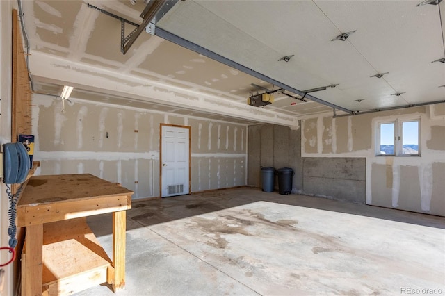 20155 Hideout Ln, Nathrop, CO 81236 - garage featuring a garage door opener