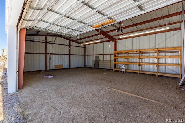 20155 Hideout Ln, Nathrop, CO 81236 - garage featuring a garage door opener and metal wall