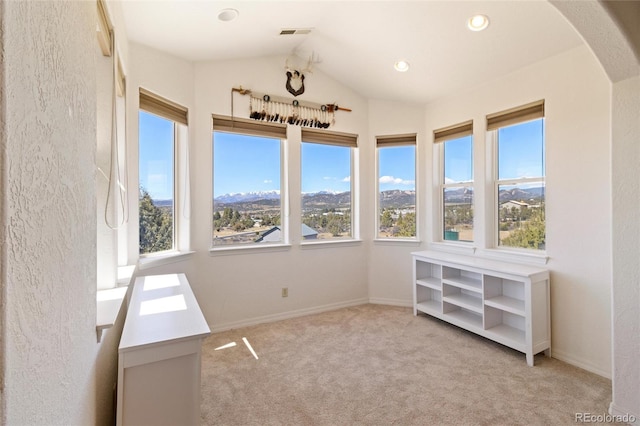 249 Valle Escondido Dr, Durango, CO 81303 - unfurnished sunroom with lofted ceiling, a healthy amount of sunlight, and visible vents