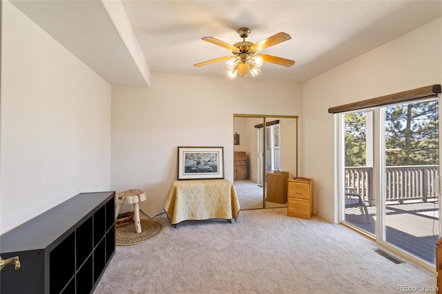 249 Valle Escondido Dr, Durango, CO 81303 - carpeted bedroom with access to outside, a ceiling fan, and visible vents