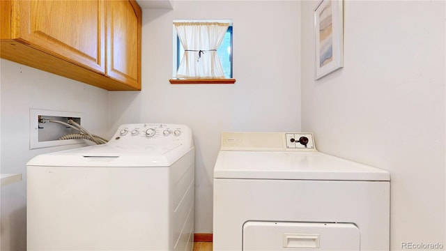 2545 N State Highway 67, Sedalia, CO 80135 - washroom featuring cabinet space and separate washer and dryer