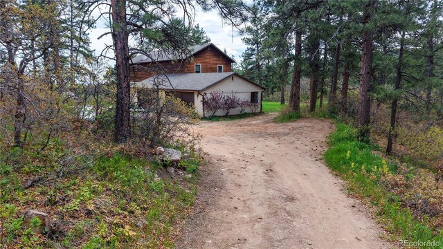 2545 N State Highway 67, Sedalia, CO 80135 - view of side of home with dirt driveway