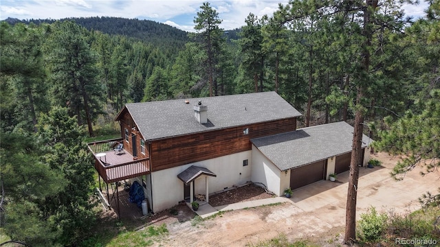 2545 N State Highway 67, Sedalia, CO 80135 - aerial view of property and surrounding area with a heavily wooded area