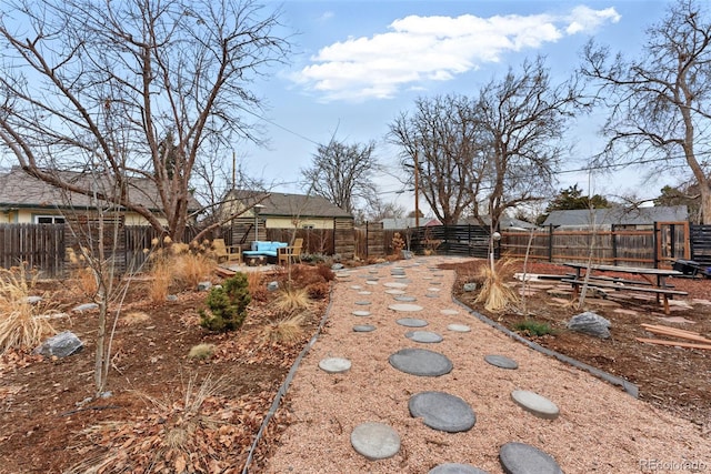 view of yard with a fenced backyard