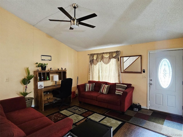 4677 S Salida St, Aurora, CO 80015 - living area featuring a ceiling fan, wood finished floors, vaulted ceiling, and a textured ceiling