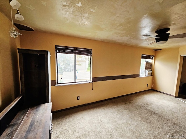 4677 S Salida St, Aurora, CO 80015 - carpeted spare room featuring plenty of natural light, ceiling fan, baseboards, and cooling unit