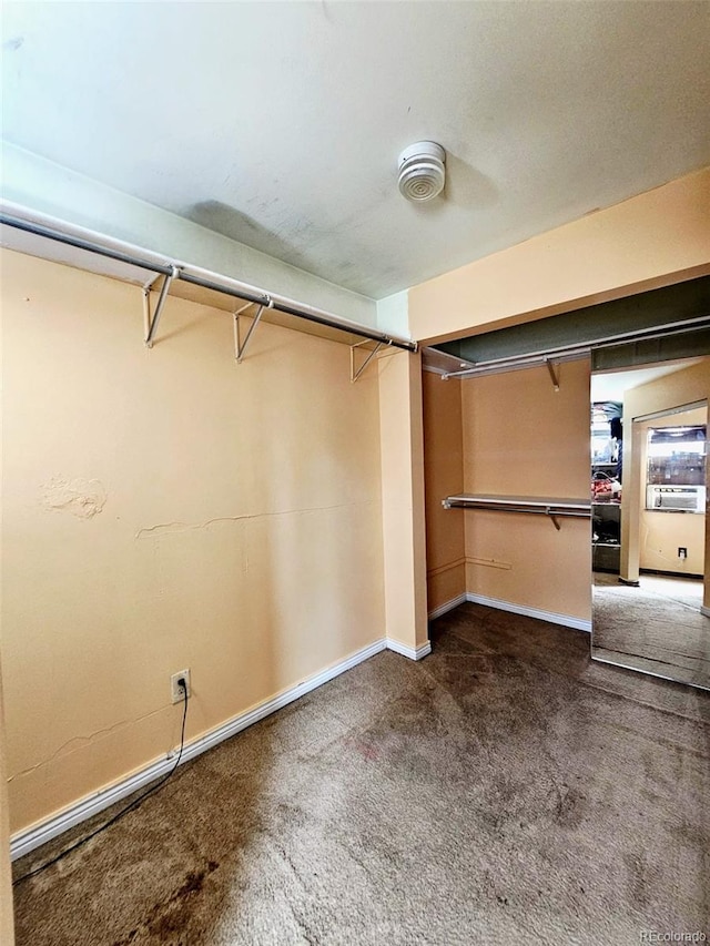 4677 S Salida St, Aurora, CO 80015 - spacious closet featuring dark carpet