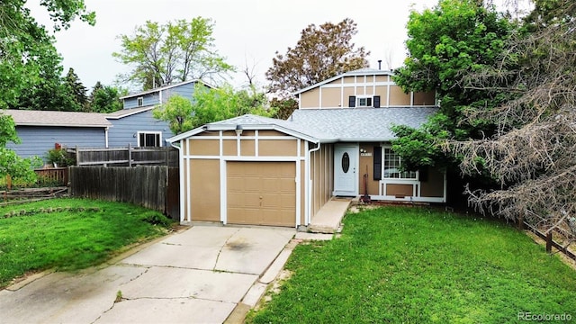 4677 S Salida St, Aurora, CO 80015 - view of front of property featuring a garage, concrete driveway, stucco siding, and roof with shingles