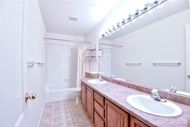 full bathroom featuring shower / tub combo with curtain, vanity, and toilet