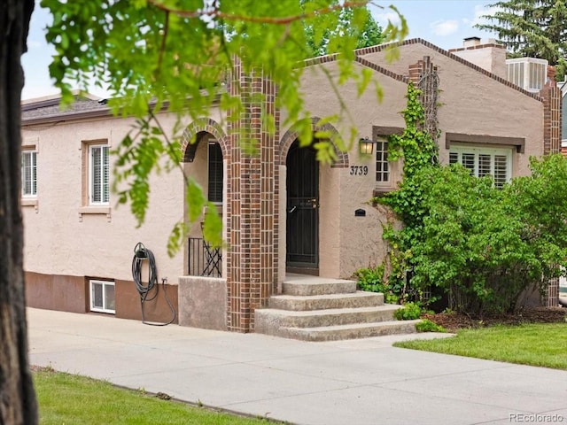 3739 W 46th Ave, Denver, CO 80211 - view of front of property with stucco siding