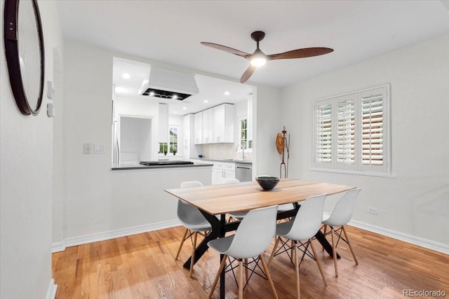 3739 W 46th Ave, Denver, CO 80211 - dining area with light wood finished floors, a ceiling fan, baseboards, and recessed lighting