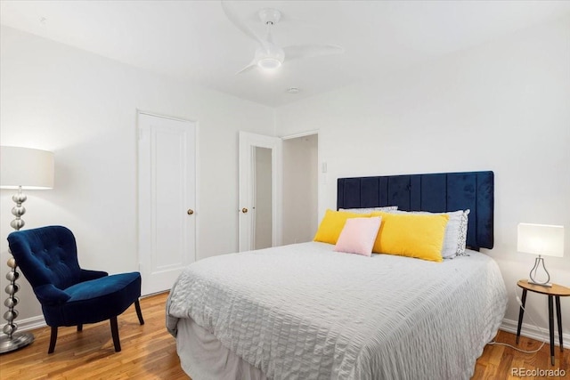 3739 W 46th Ave, Denver, CO 80211 - bedroom featuring wood finished floors, ceiling fan, and baseboards
