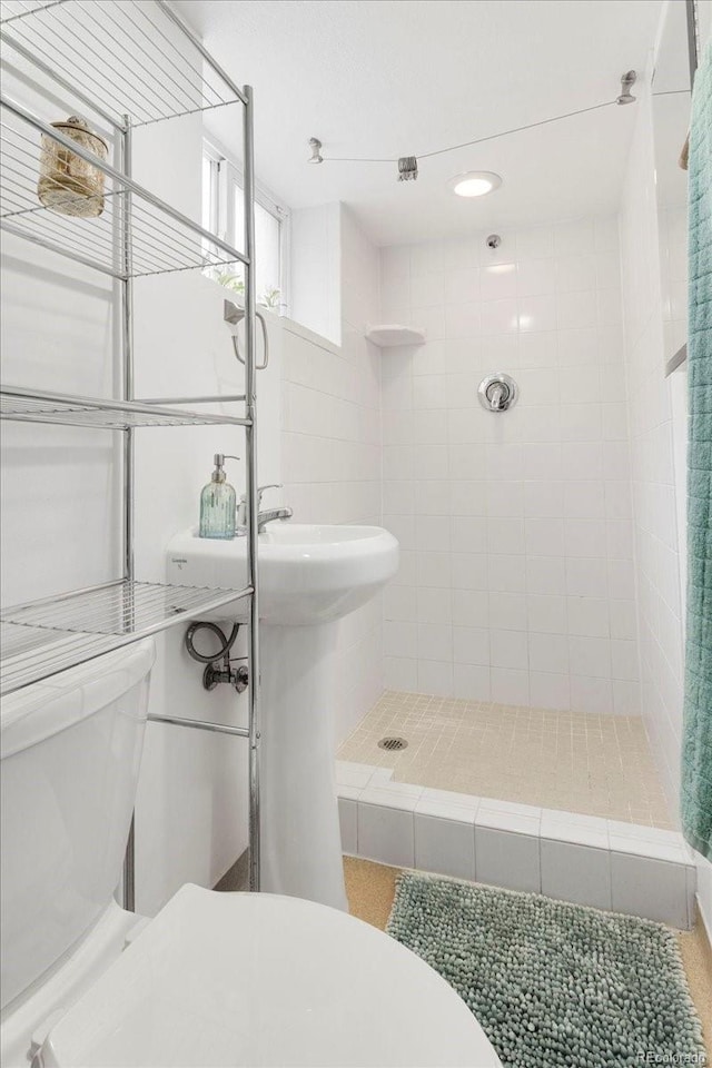 3739 W 46th Ave, Denver, CO 80211 - full bathroom with toilet and a tile shower