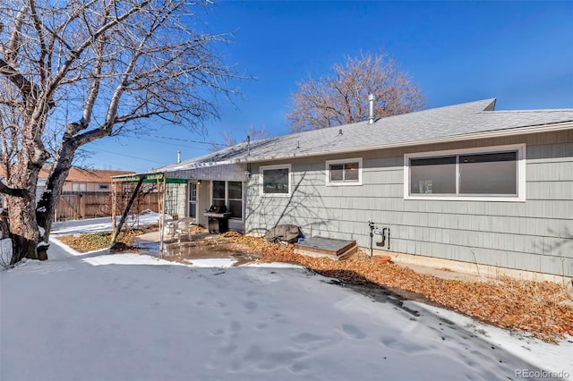 view of snow covered property