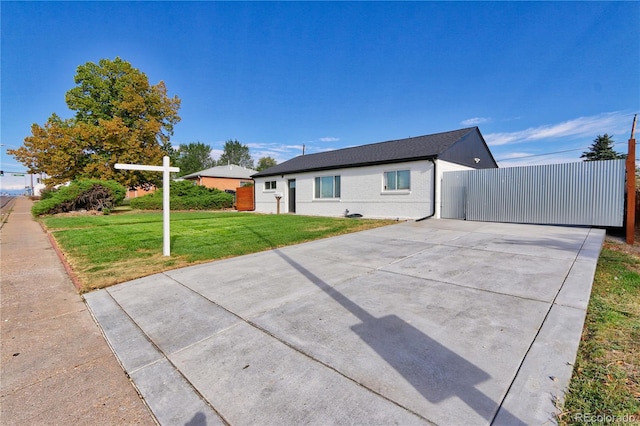 exterior space with a front yard