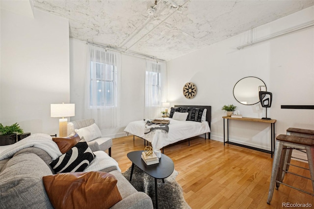 bedroom featuring light wood-type flooring