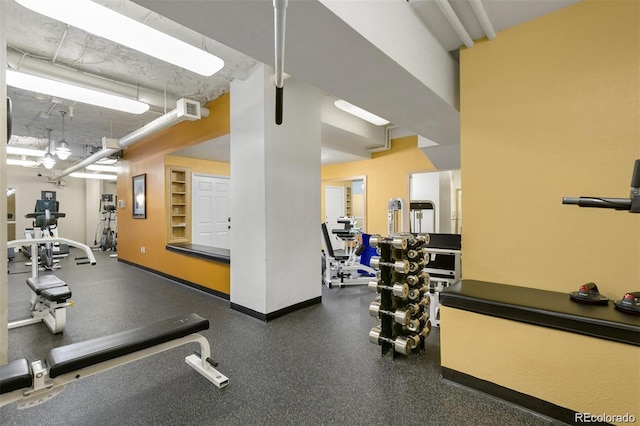 gym with visible vents and baseboards