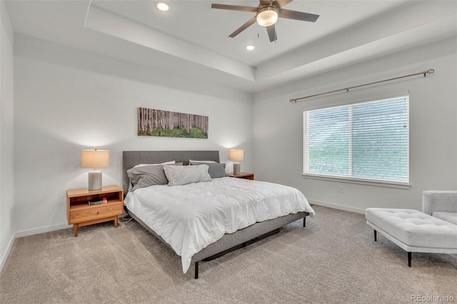 5714 Villa Lorenzo Dr, Colorado Springs, CO 80919 - carpeted bedroom featuring baseboards, a raised ceiling, recessed lighting, and a ceiling fan