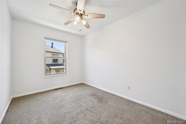 920 44th Avenue Ct Unit 30, Greeley, CO 80634 - carpeted spare room with ceiling fan and a textured ceiling