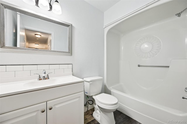 920 44th Avenue Ct Unit 30, Greeley, CO 80634 - full bath with tasteful backsplash, vanity, wood finished floors, and  shower combination