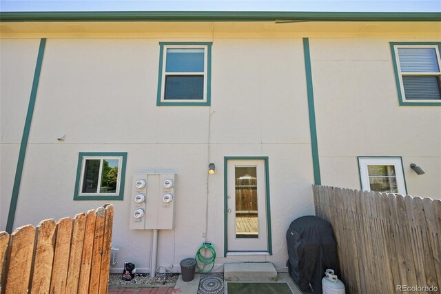 920 44th Avenue Ct Unit 30, Greeley, CO 80634 - rear view of house featuring stucco siding