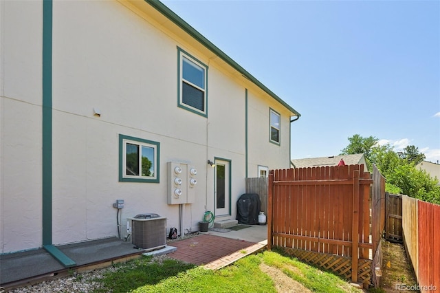 920 44th Avenue Ct Unit 30, Greeley, CO 80634 - back of house featuring stucco siding and a patio area
