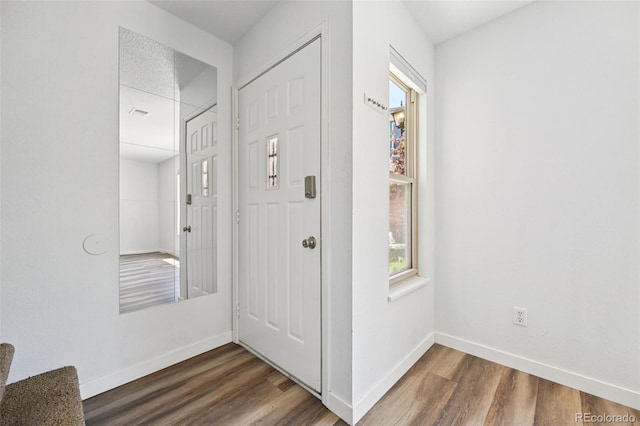 920 44th Avenue Ct Unit 30, Greeley, CO 80634 - corridor featuring dark wood-type flooring