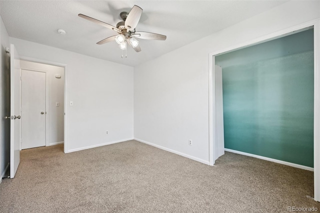 920 44th Avenue Ct Unit 30, Greeley, CO 80634 - spare room with a ceiling fan, carpet floors, and a smoke detector