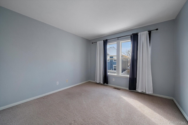 view of carpeted spare room