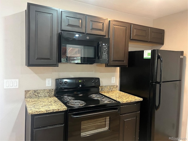 kitchen featuring light stone countertops, dark brown cabinets, and black appliances