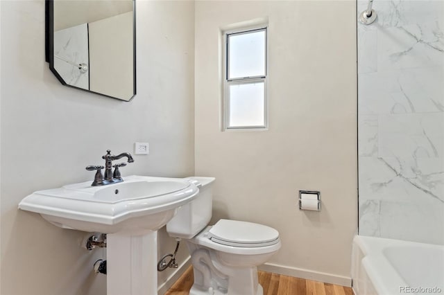 521 Harrison St, Denver, CO 80206 - full bath featuring wood finished floors and baseboards