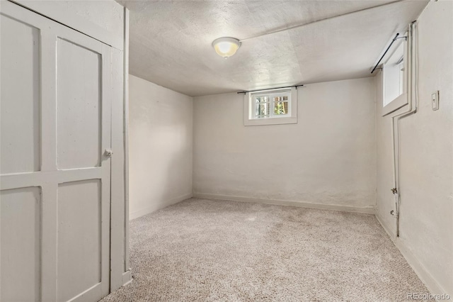 521 Harrison St, Denver, CO 80206 - below grade area featuring carpet flooring and a textured ceiling