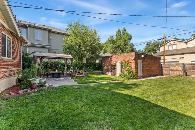 521 Harrison St, Denver, CO 80206 - view of yard with a gazebo, a patio, and an outbuilding
