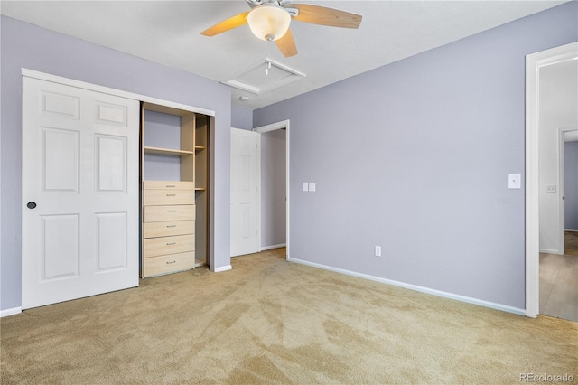 unfurnished bedroom with a closet, ceiling fan, and carpet flooring