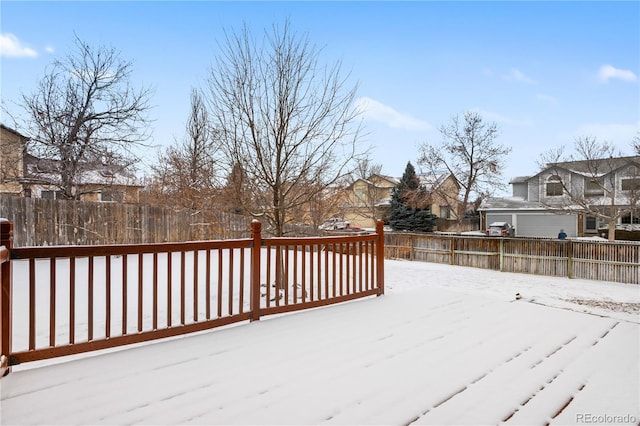 view of snow covered deck