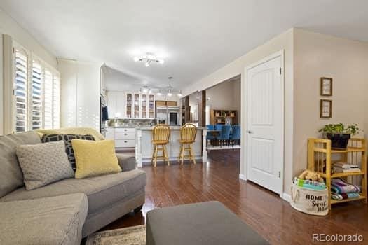 living area with wood finished floors