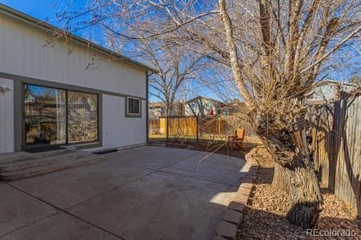 view of patio / terrace featuring fence