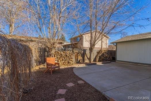 view of yard with a patio area and fence