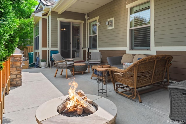 10182 Bristleridge St, Parker, CO 80134 - view of patio / terrace featuring an outdoor living space with a fire pit