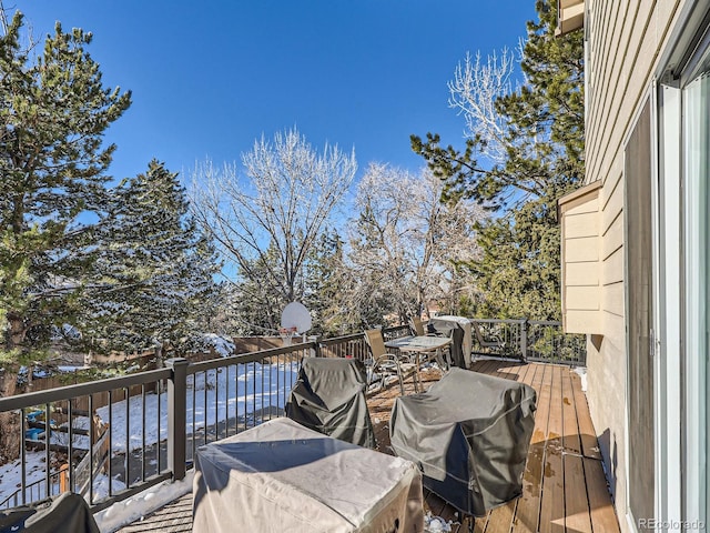 wooden deck with grilling area