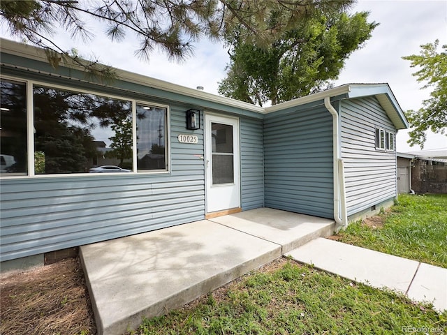 10025 W 8th Ave, Lakewood, CO 80215 - property entrance with crawl space and a patio