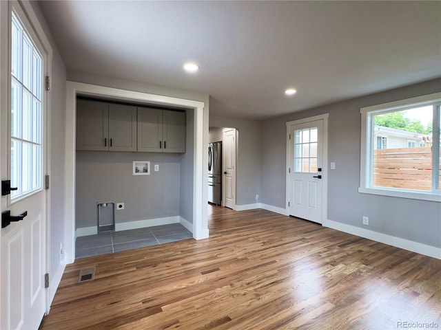 10025 W 8th Ave, Lakewood, CO 80215 - foyer entrance with wood finished floors, baseboards, and recessed lighting