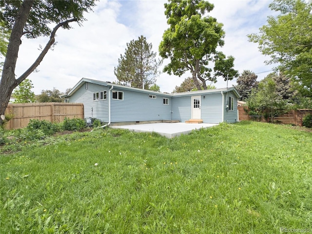 10025 W 8th Ave, Lakewood, CO 80215 - rear view of house featuring a patio