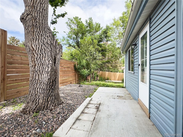 10025 W 8th Ave, Lakewood, CO 80215 - fenced backyard with a patio area